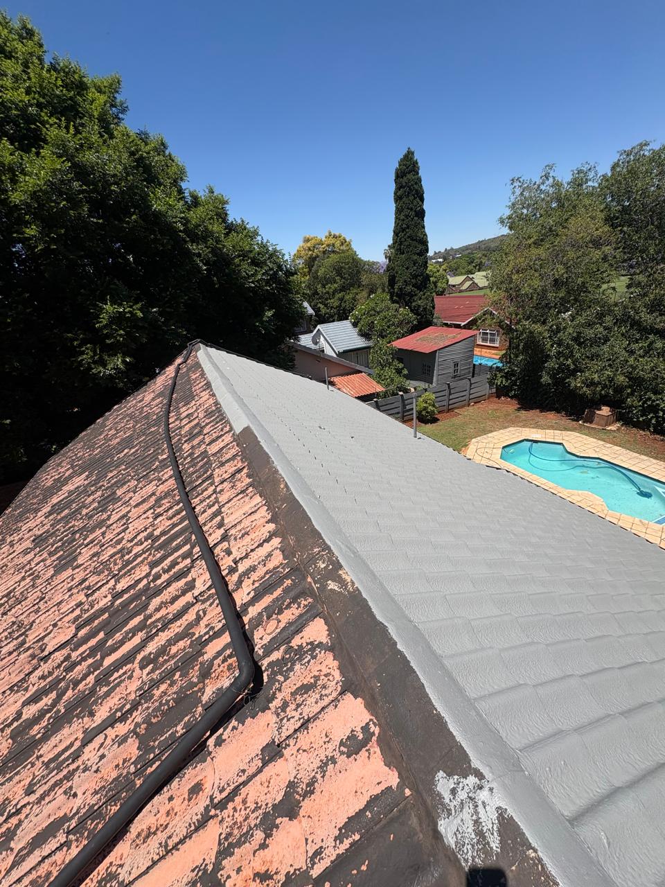 Exterior roof coating — before and after
